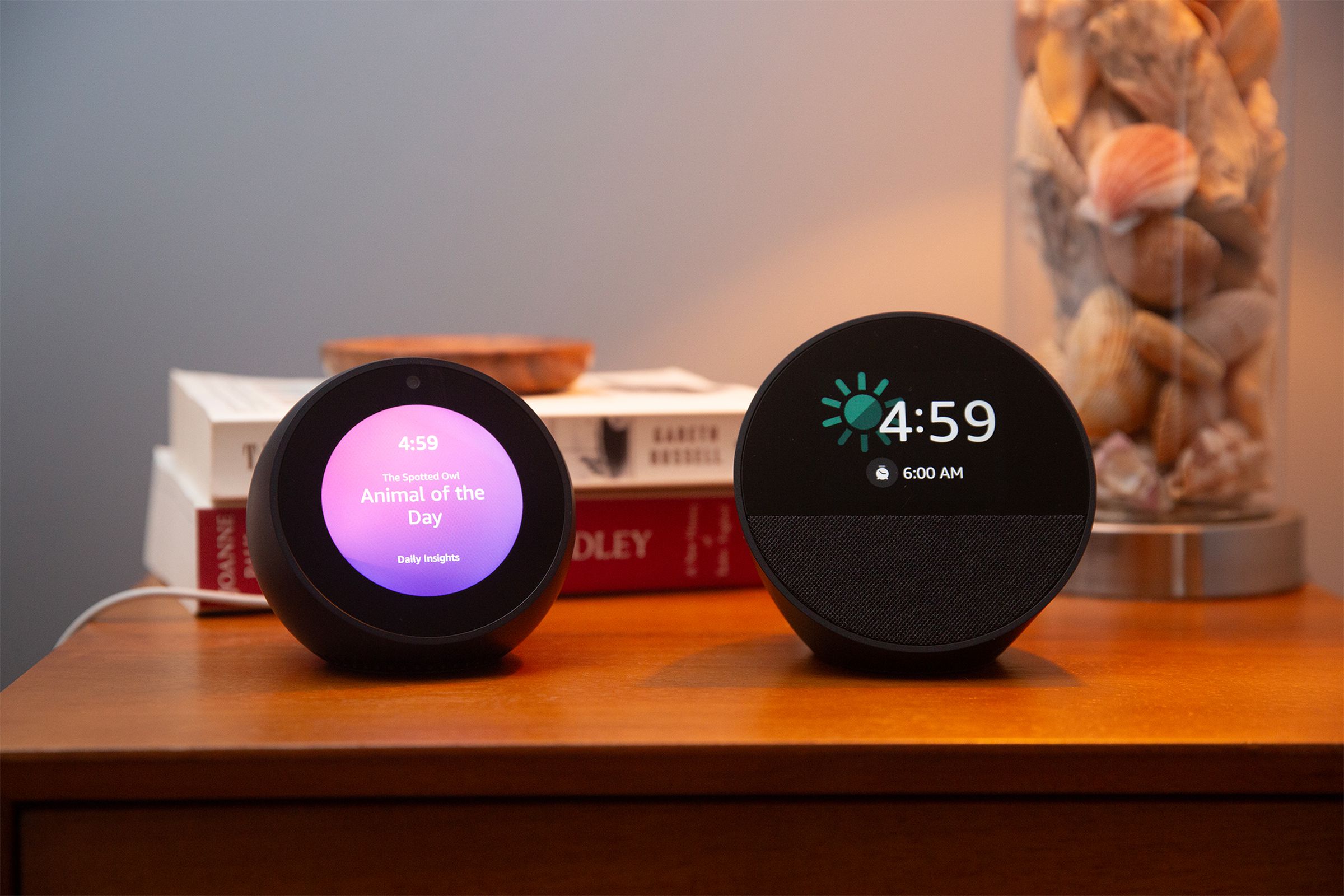 Photo of an Echo Spot sitting on a nightstand.