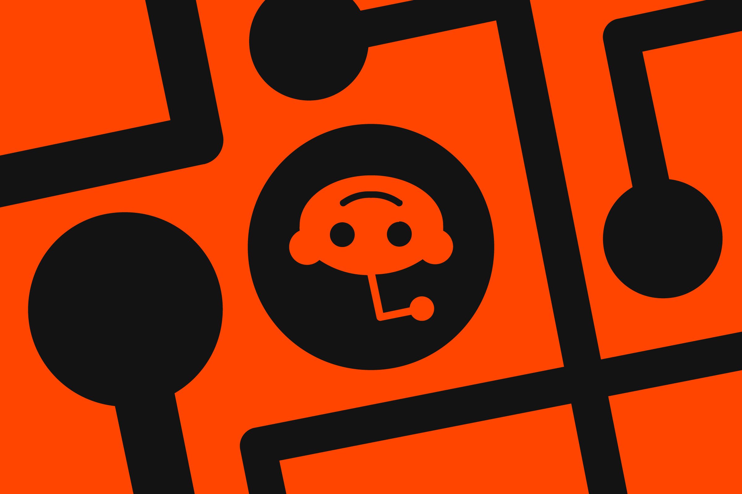 A Reddit logo shown upside down on an orange background.