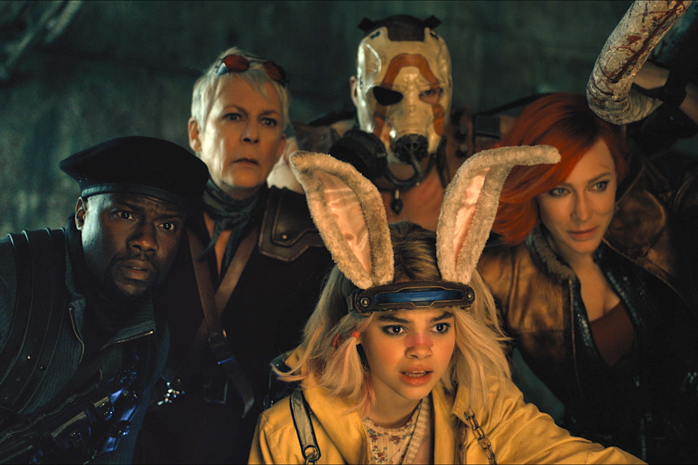 Production still from the Borderlands movie featuring Kevin Hart as Roland, Jamie Lee Curtis as Tannis, Ariana Greenblatt as Tiny Tina, Florian Munteanu as Krieg, and Cate Blanchett as Lilith.