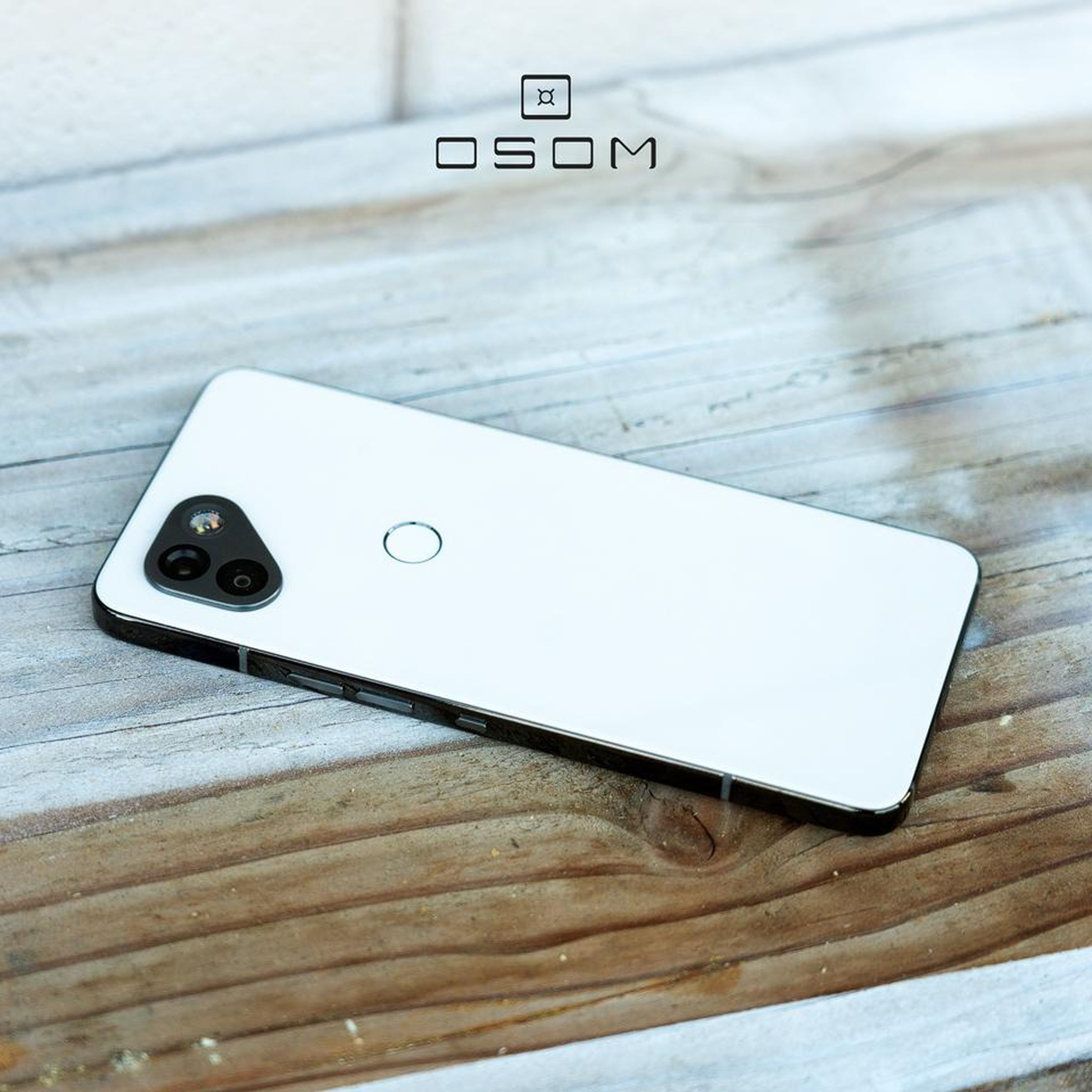 A picture of the OSOM OV1 smartphone laying face down.