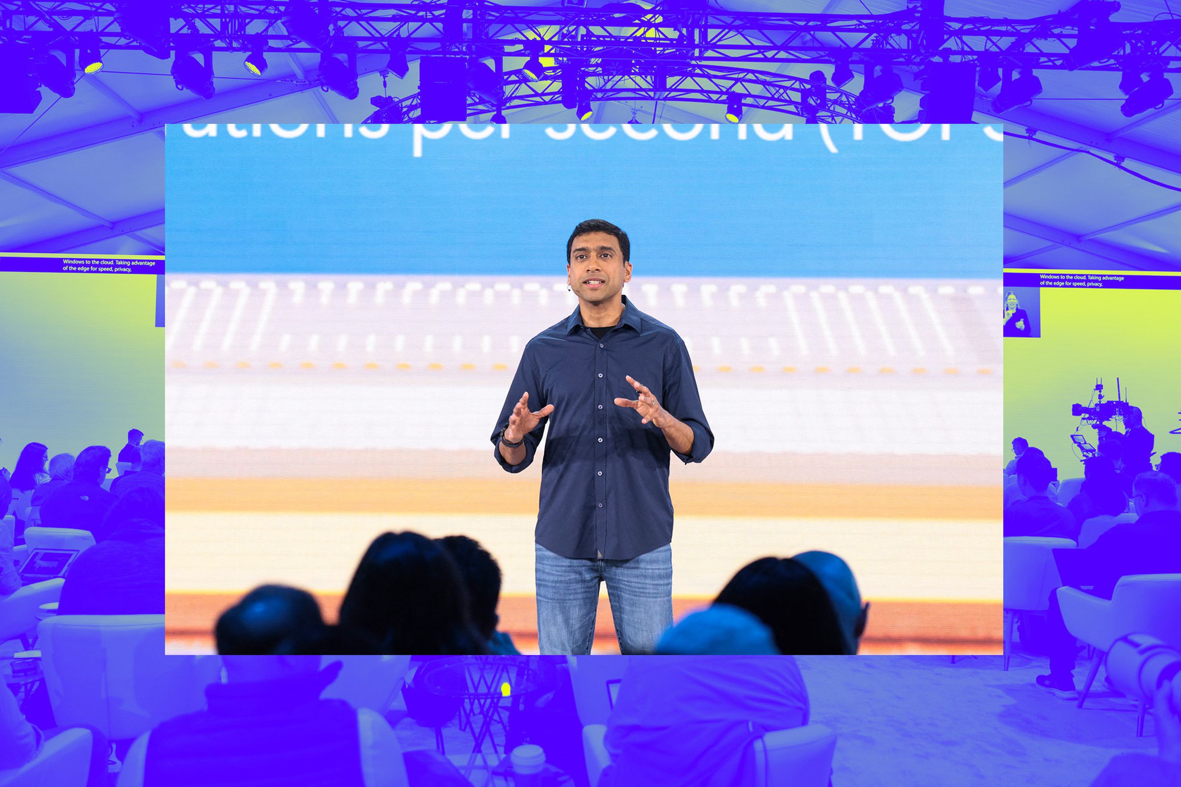 An image of Microsoft’s Pavan Davuluri, on top of a Vergecast illustration.