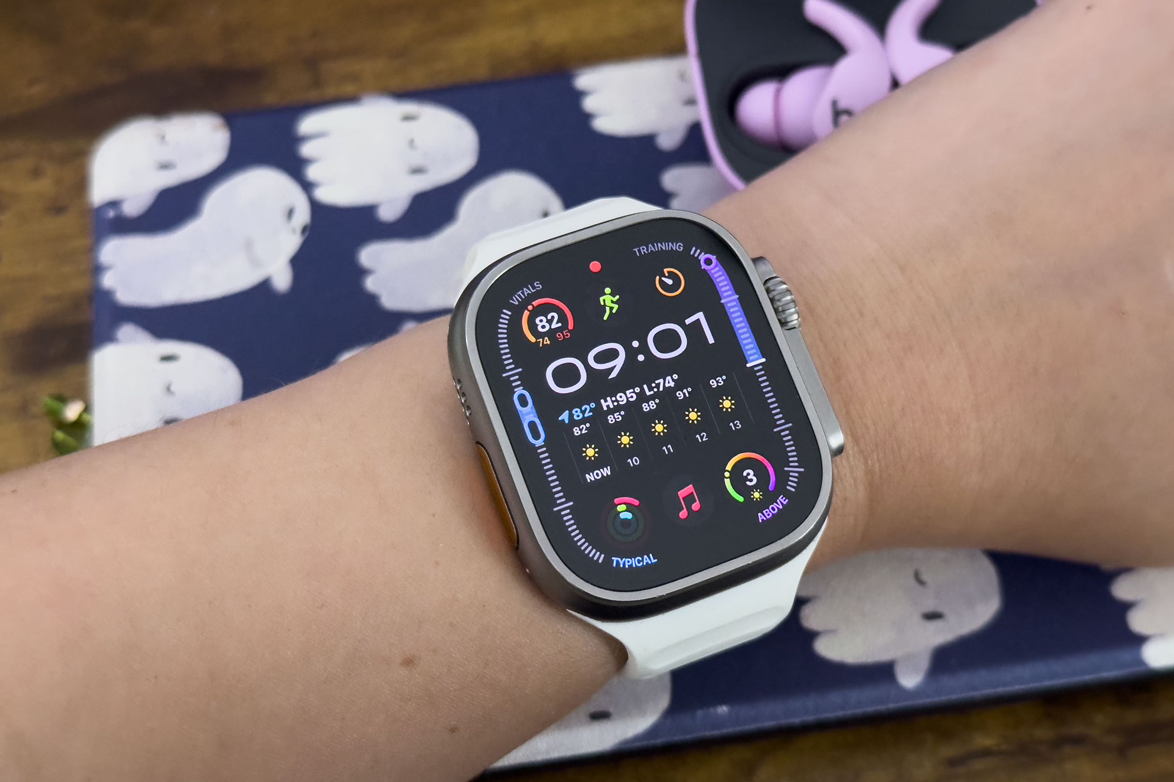 Close-up of person wearing Apple Watch Ultra 2 with watchOS 11